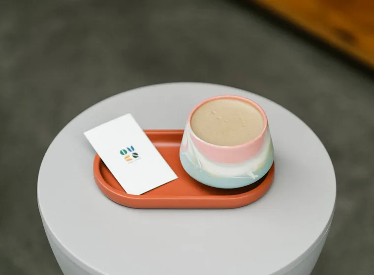 Hojicha latte served in a ceramic cup